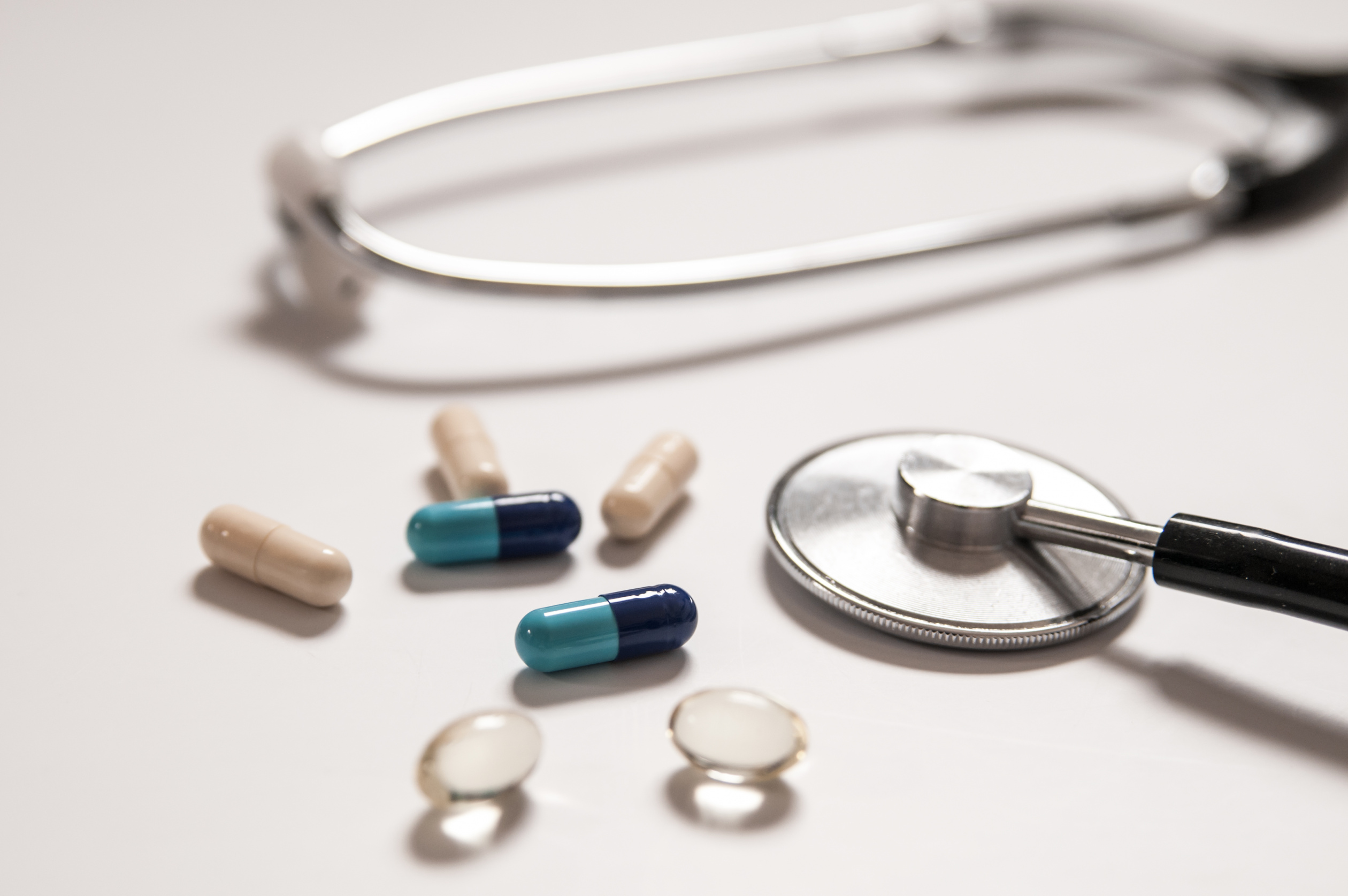 stethoscope-white-background-with-mix-pills-isolated.jpg